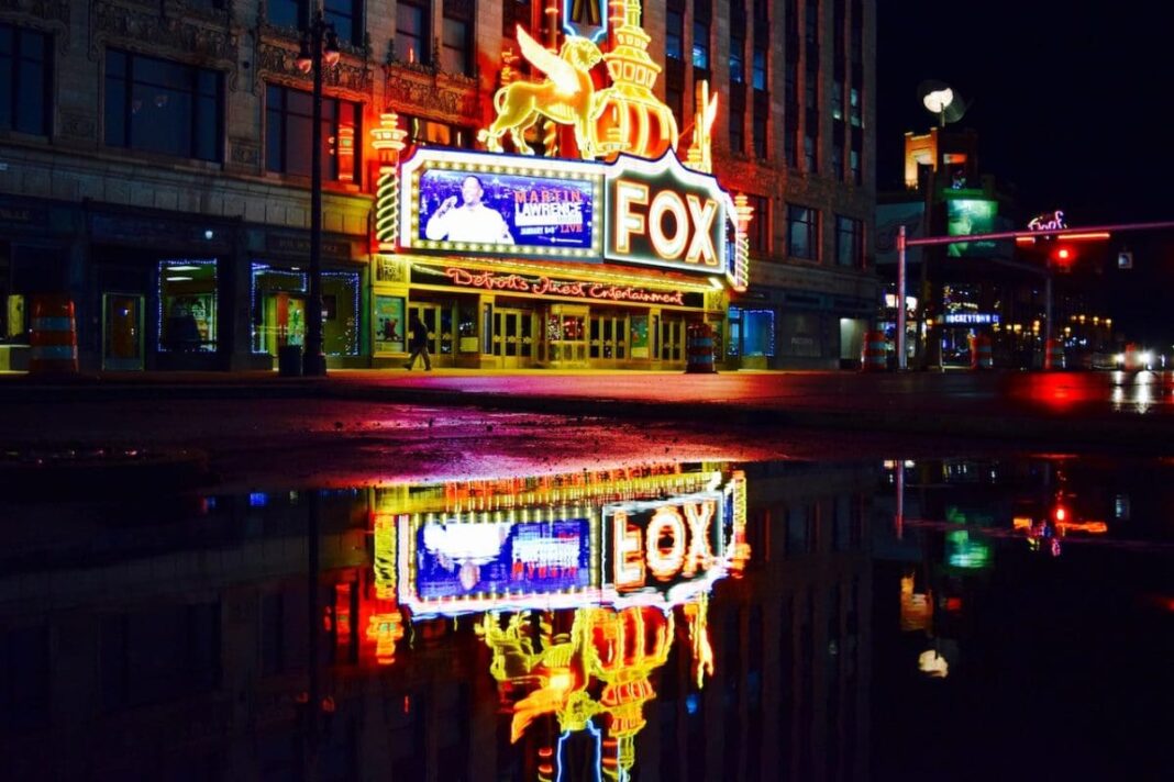 neon fox theater sign on building