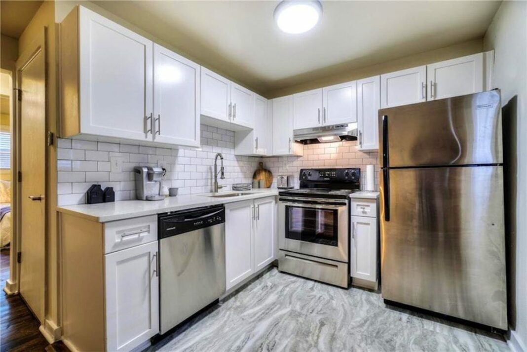 updated kitchen with new stainless steel appliances