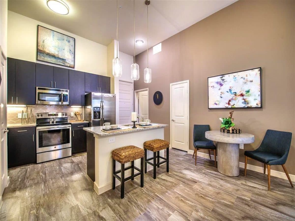 open floor plan kitchen with bar stools