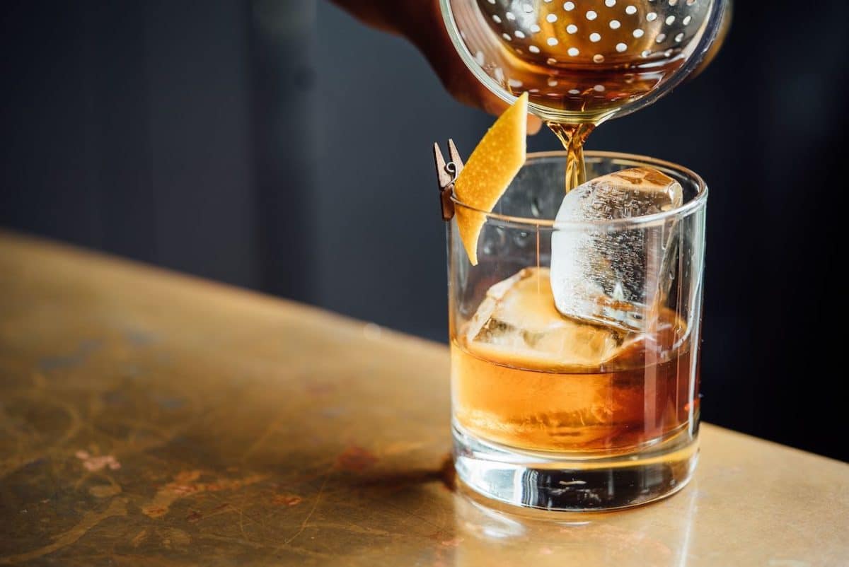 old fashioned being poured into glass